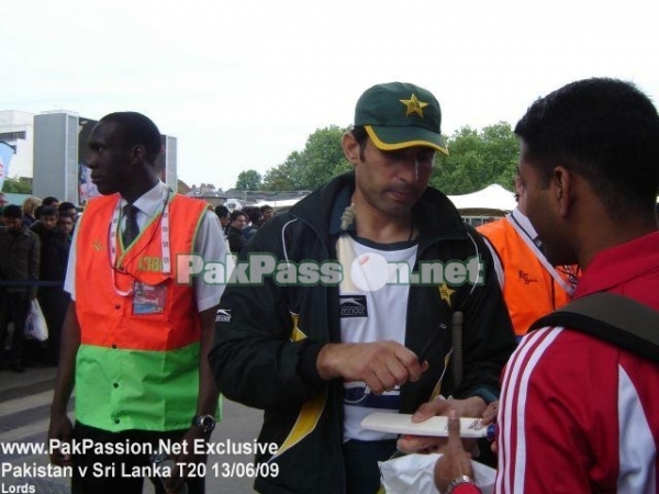 Misbah ul Haq signs an autograph for a fan