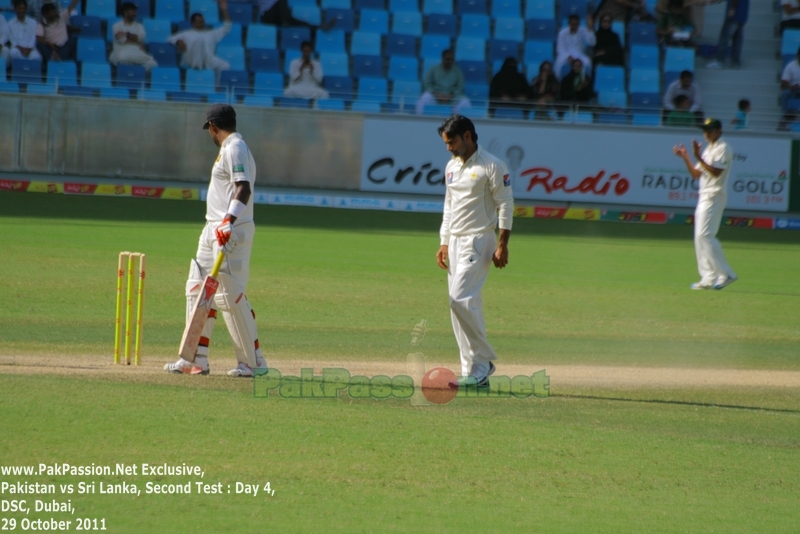 Mohammad Hafeez with the ball in hand