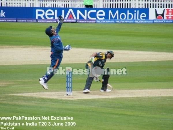 MS Dhoni does well to collect the ball
