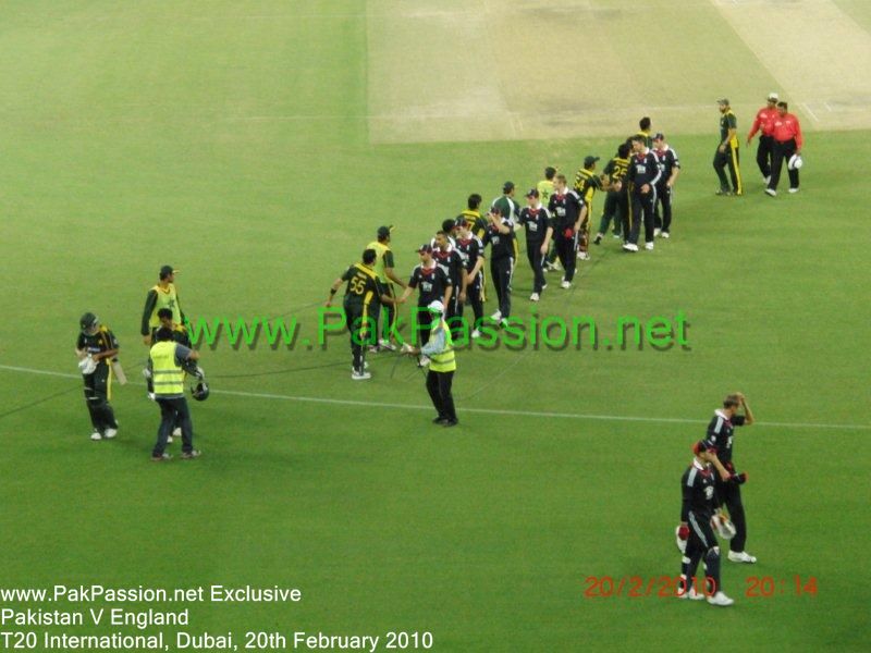 Pakistan and England players shake hands at the end of the game