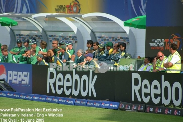 Pakistani and Irish team in their respective team dugouts