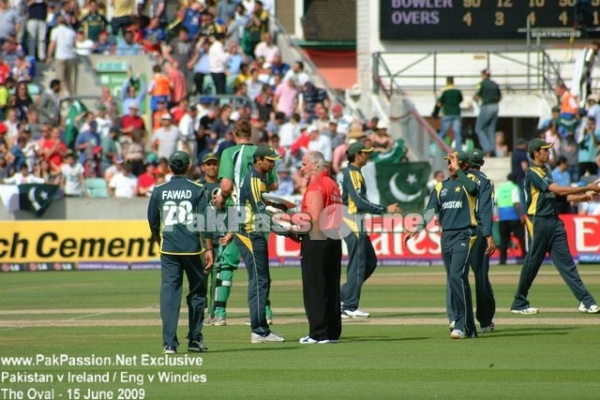 Pakistani players congratulate one another on victory against Ireland