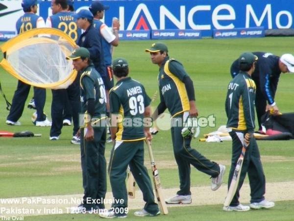 Pakistani players take a close look at the pitch