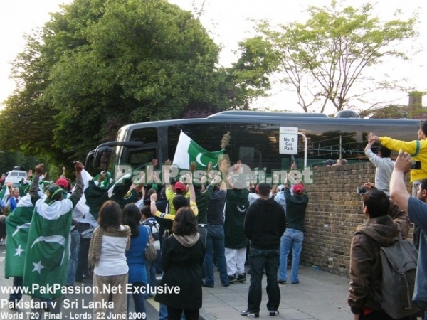 Pakistani supporters eagerly await the departing team bus