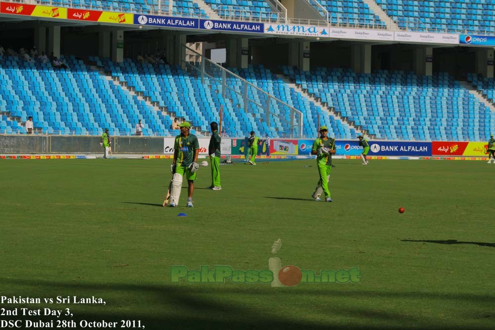 Pakistan's cricket team practicing in the sunny atmosphere