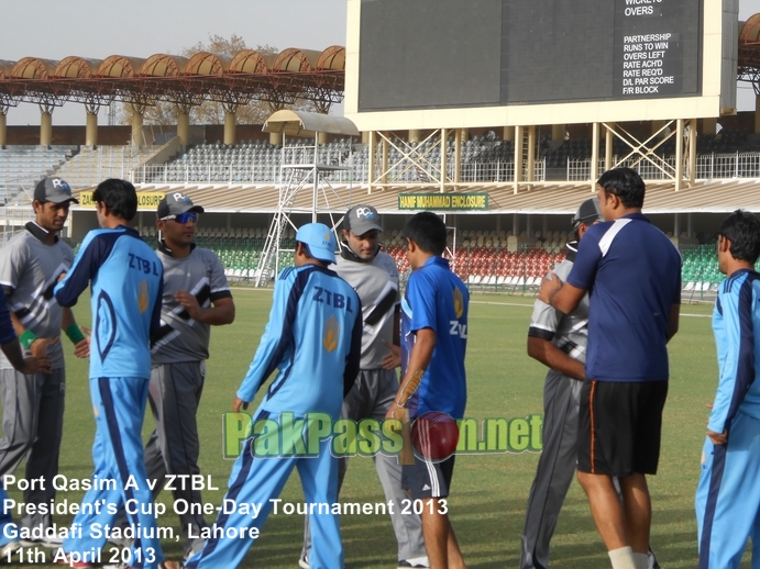 Players from Port Qasim and ZTBL shake hands