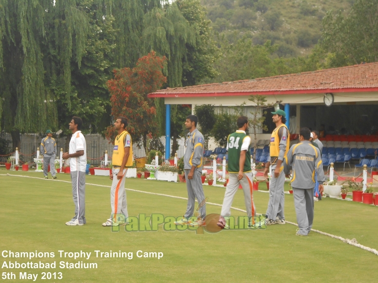 Players line up for fielding drills