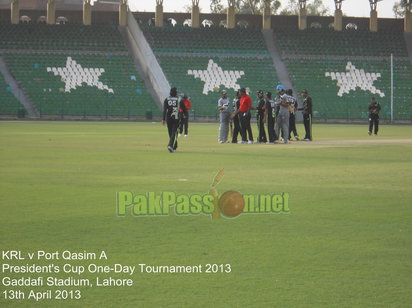 Players shake hands as KRL win the match by 40 runs