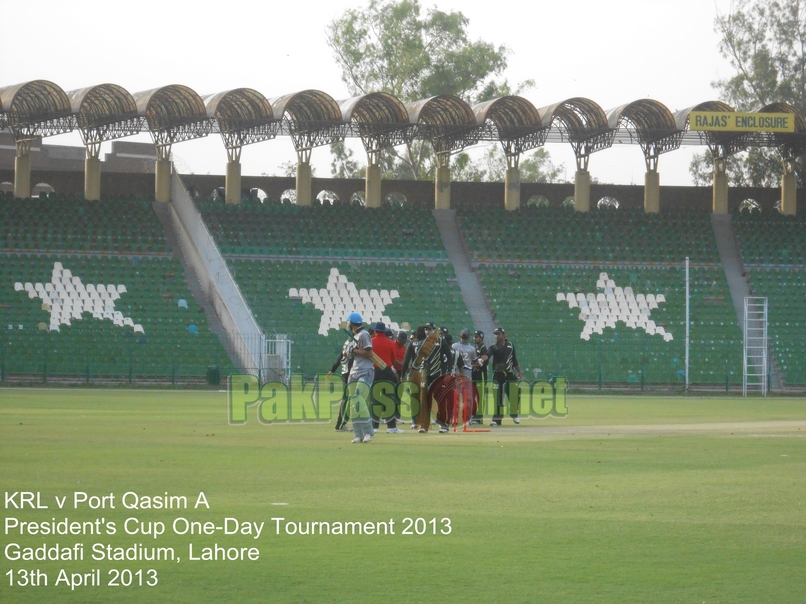 Players shake hands as KRL win the match by 40 runs