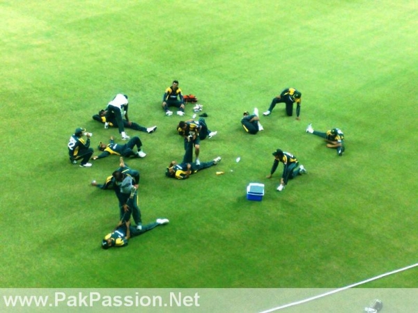 Players warm-up at the Dubai Sports City