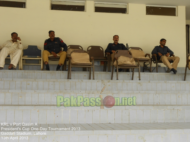 Police men watch the match