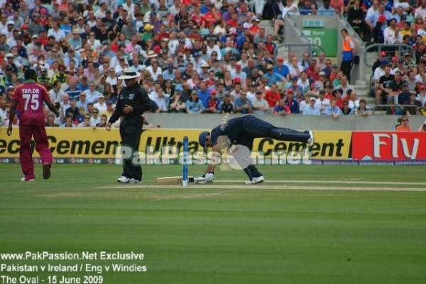 Ravi Bopara stretches at the crease