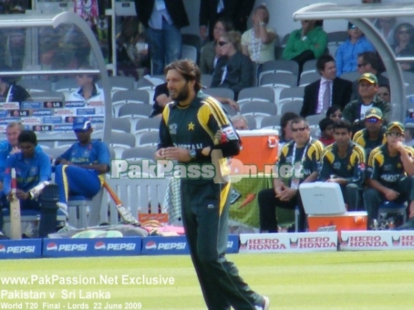 Shahid Afridi on his way to bowl another delivery