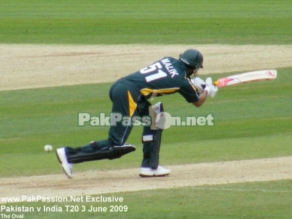 Shoaib Malik works the ball to the onside