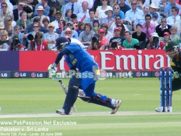 Sri Lankan batsman carefully defends a ball