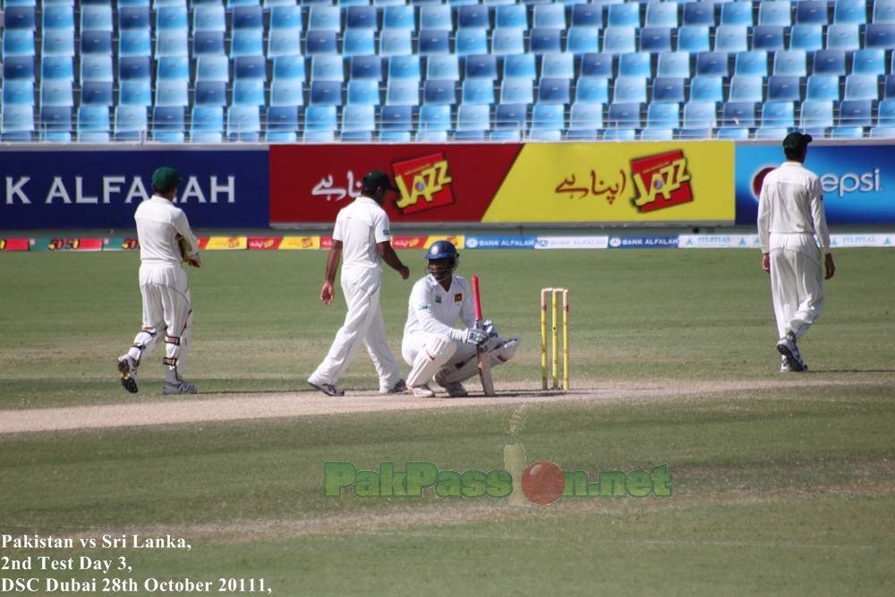 Sri Lankan opener squats before the first ball is delivered