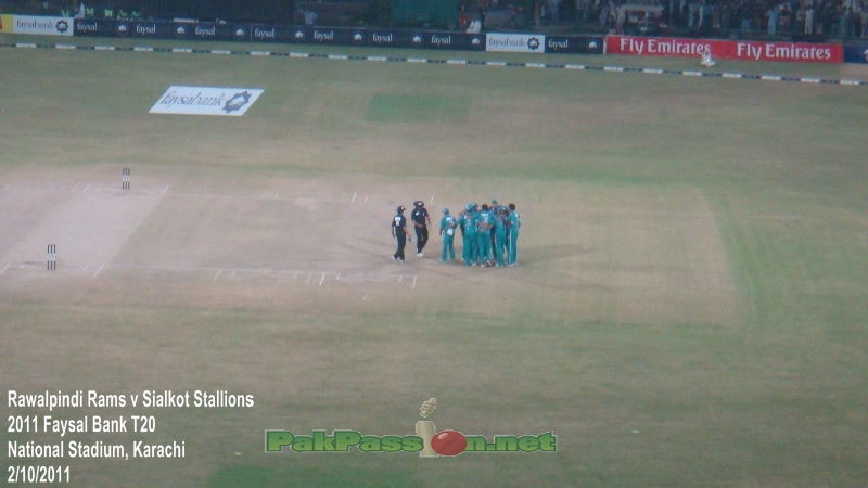 The Rawalpindi Rams team engages in a team huddle