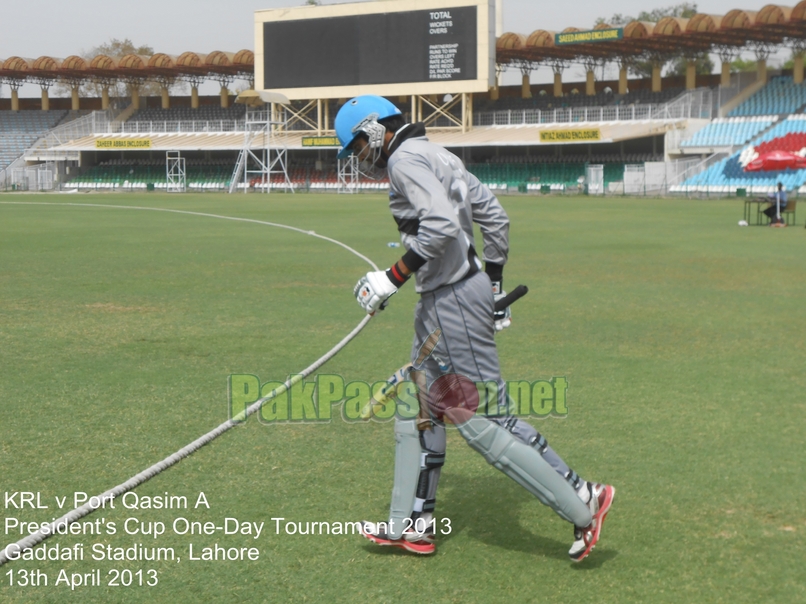 Umar Amin walks into bat