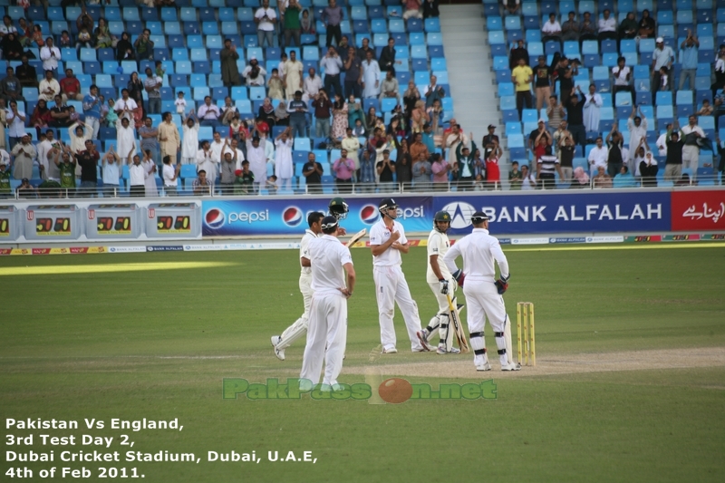 Younis Khan walks back to the batting crease