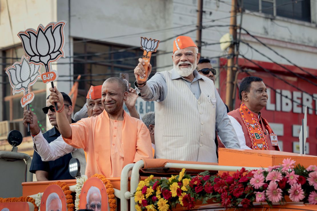 Prime Minister Narendra Modi greets supporters at a roadshow on April 6 in Ghaziabad, Uttar Pradesh. India's general election, with almost 970 million registered voters, is a mammoth undertaking lasting 6 weeks.