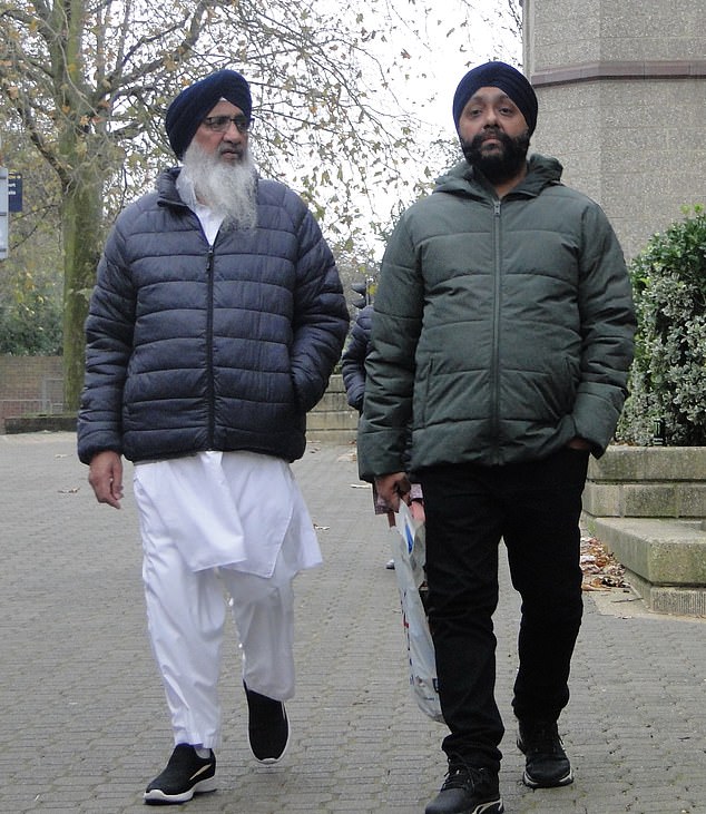 Father and son Gurbakhsh Singh (L) & Guljeet Singh (R) leaving Croydon Magistrates' Court where they denied making a false statement or representation at Heathrow , namely requesting asylum as Afghan citizens when Home Office records confirm they are Indian nationals