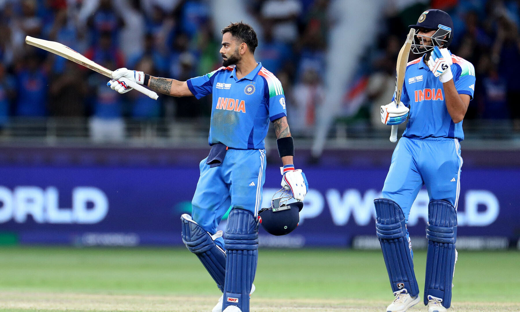  India’s Virat Kohli celebrates after hitting four runs to reach his century and win the match. — Reuters 