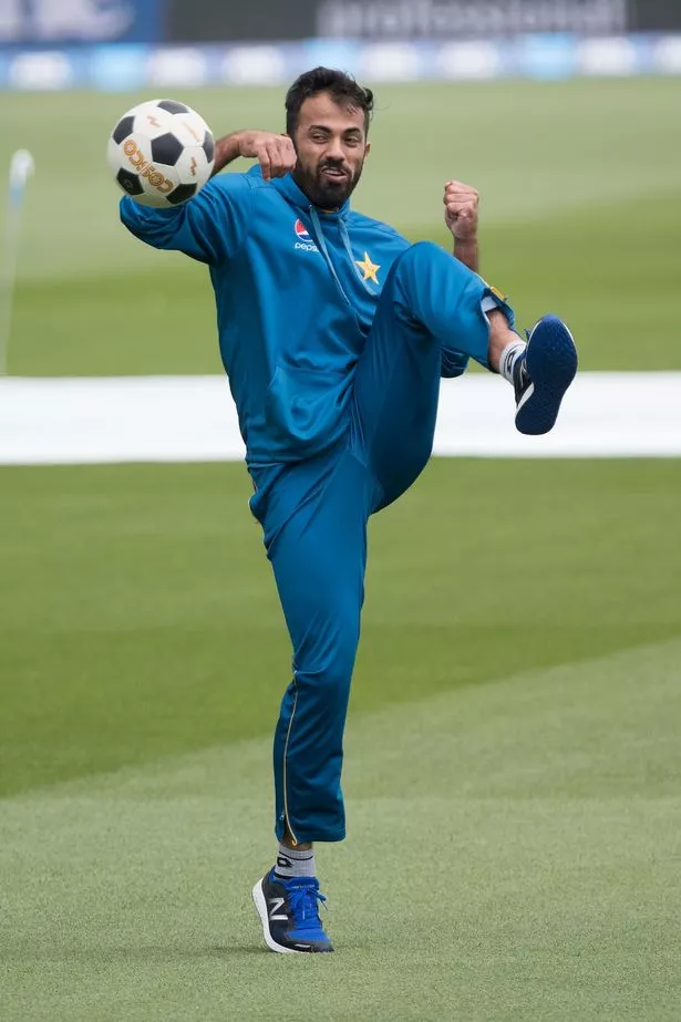 Pakistans-Wahab-Riaz-plays-with-a-footb.jpg