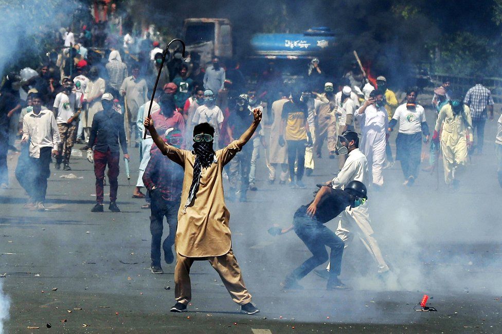 Mr Khan's arrest in May sparked nationwide protests that led to at least eight deaths Mr Khan's arrest in May sparked nationwide protests that led to at least eight deaths