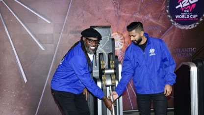 Chris Gayle and Ali Khan pulling the lever down to light up the Empire State Building